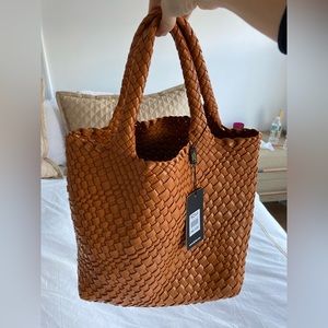 Hand knitted leather tote bag